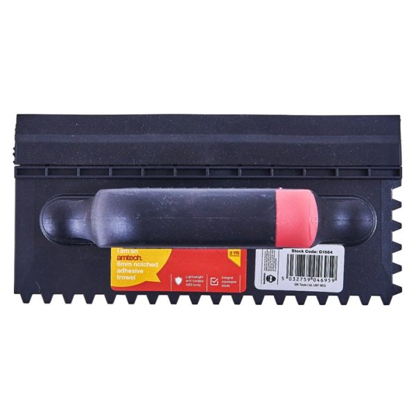 Notched adhesive trowel with squeegee blade