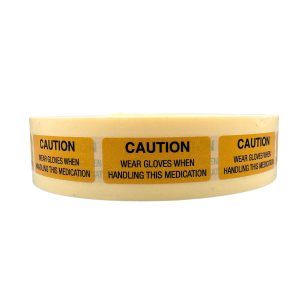 CAUTION WEAR GLOVES WHEN HANDLING THIS MEDICATION Orange label (15mm x 36mm)